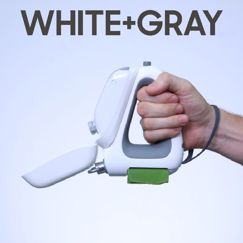 Hand holding Enhanced 3-in-1 retractable dog leash in white and gray with built-in waste bag dispenser.